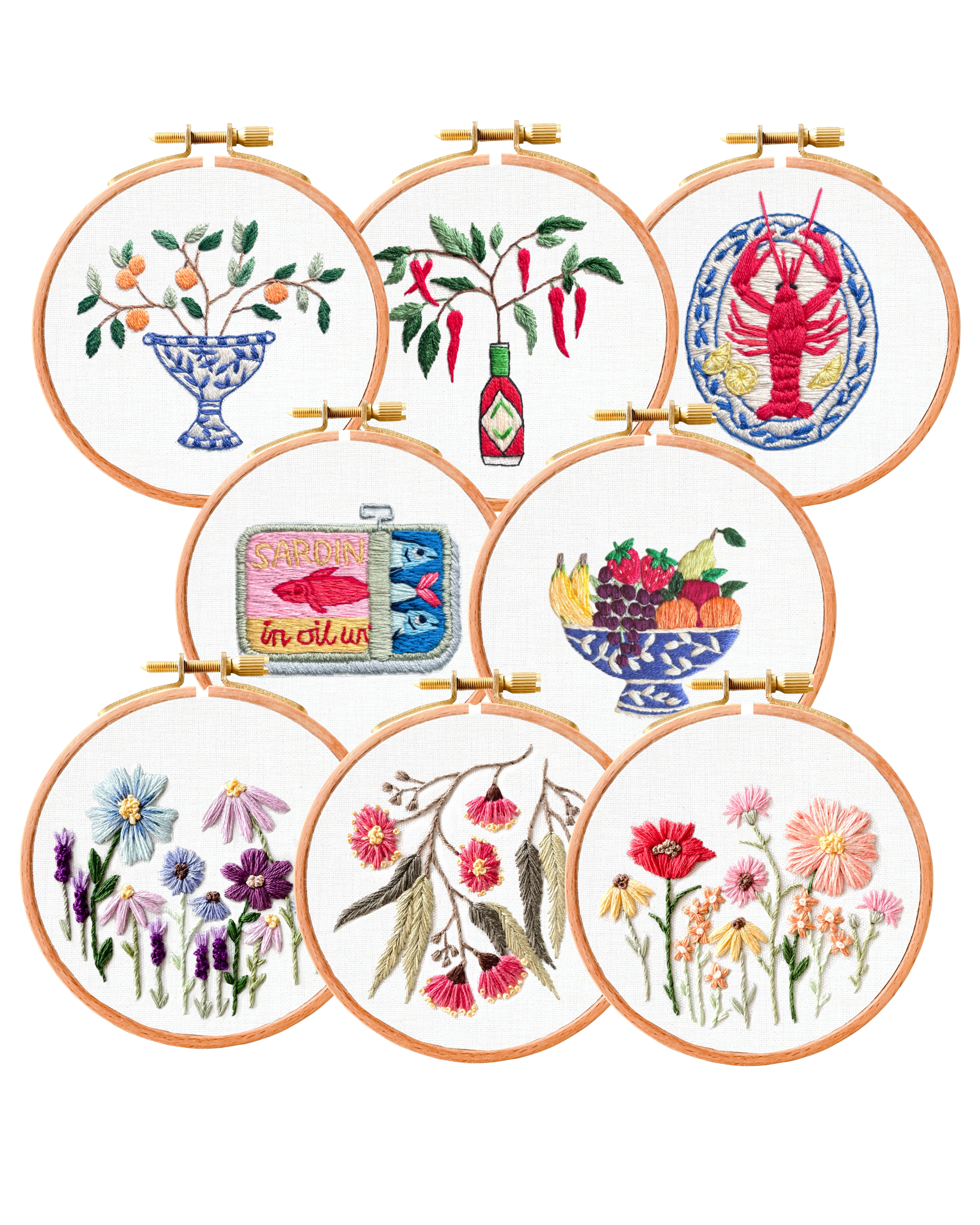 Set of embroidered hoops with various designs on a white background